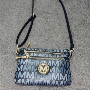 Black and gold purse, never used